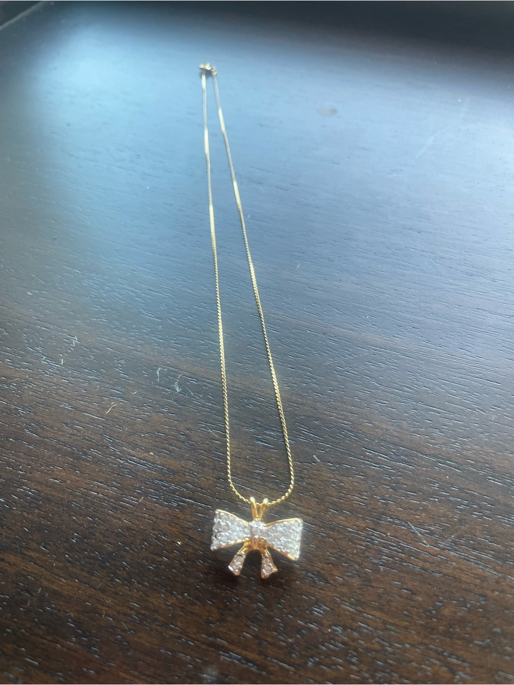 Gold Bow Pendant Necklace with Clear Crystals